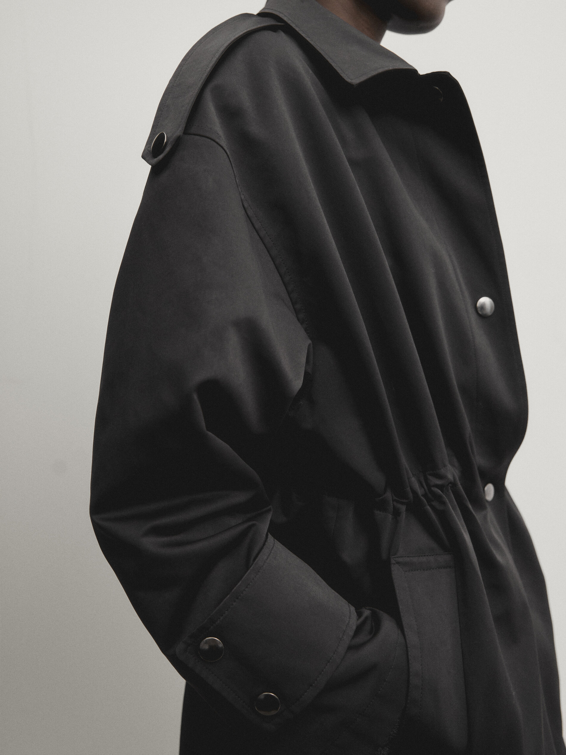 Long parka with quilted interior and adjustable waist Black