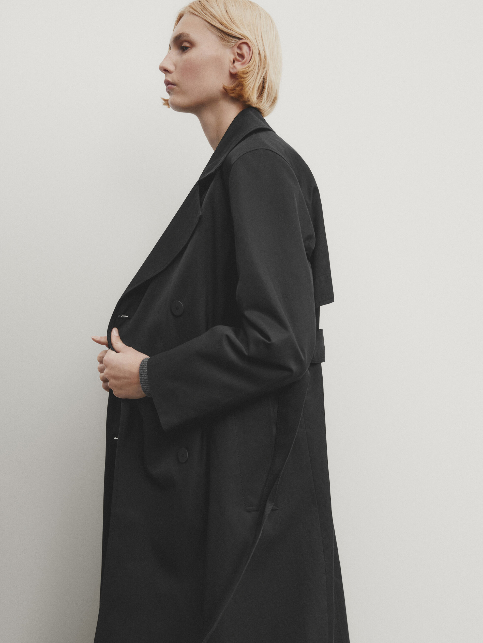 Black belted trench coat