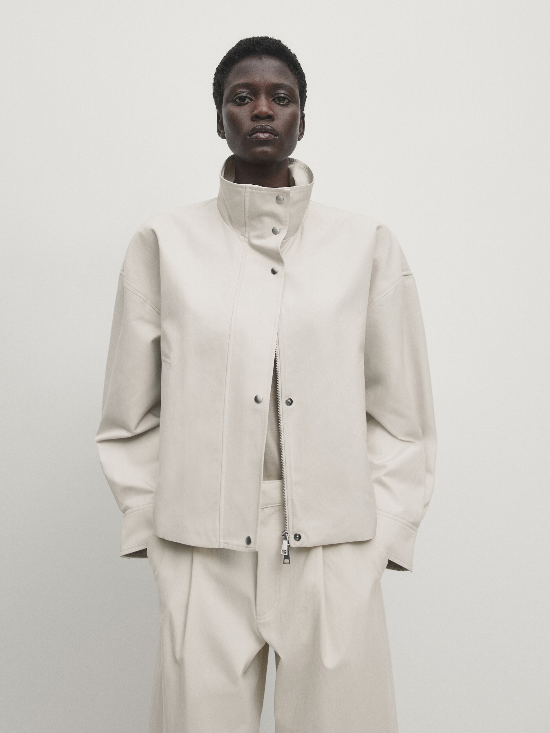 High neck jacket with snap buttons
