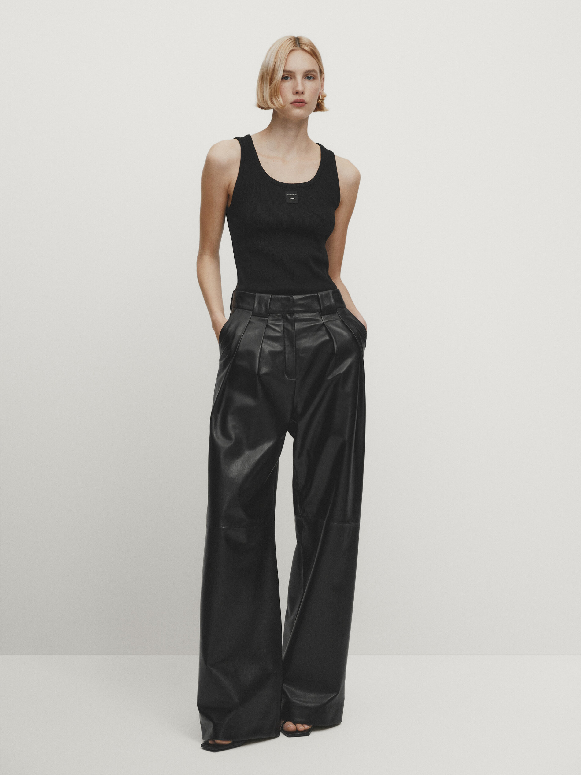 Bershka straight leg faux leather trousers in black | ASOS