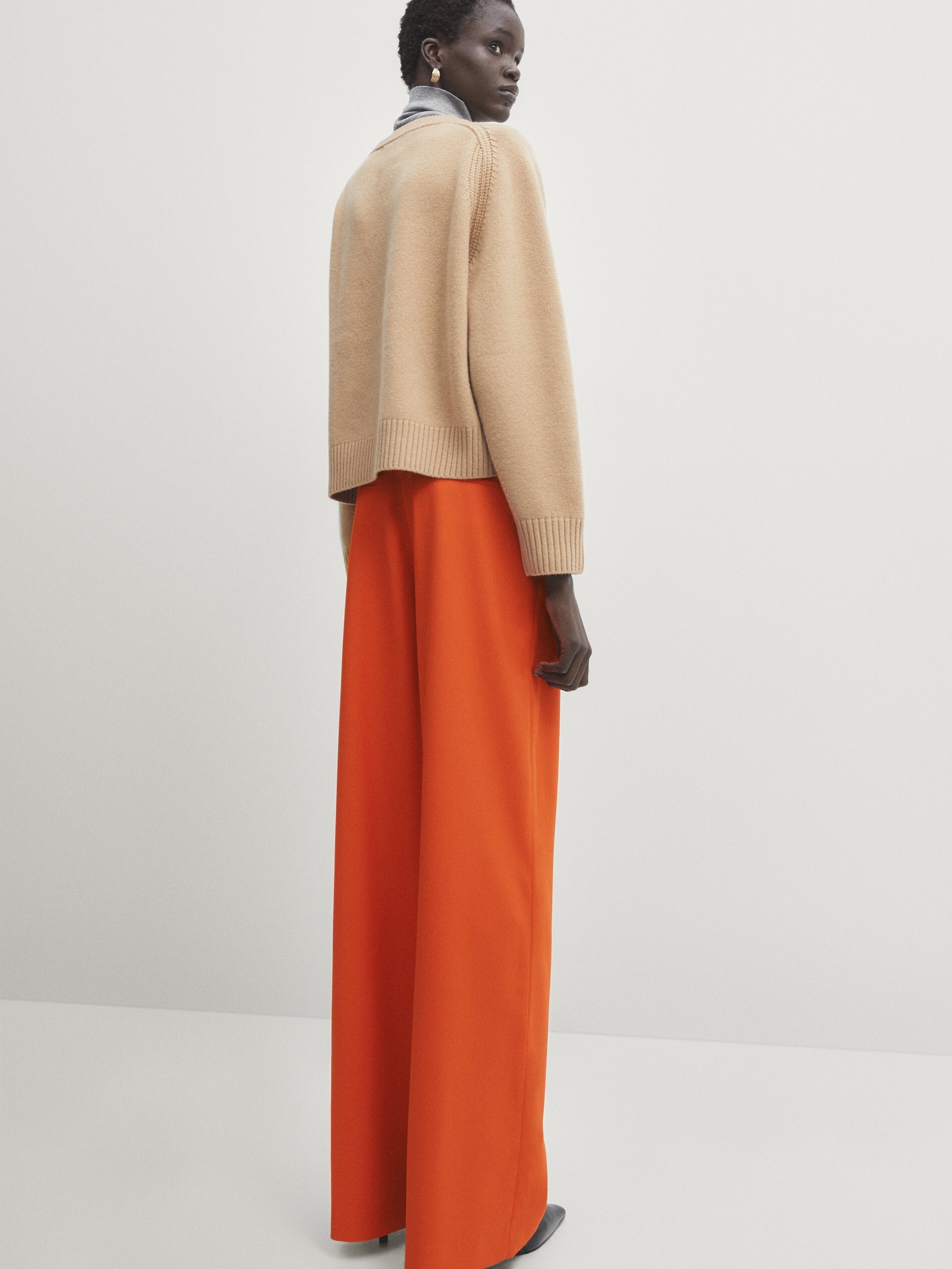 Orange cropped trousers on sale