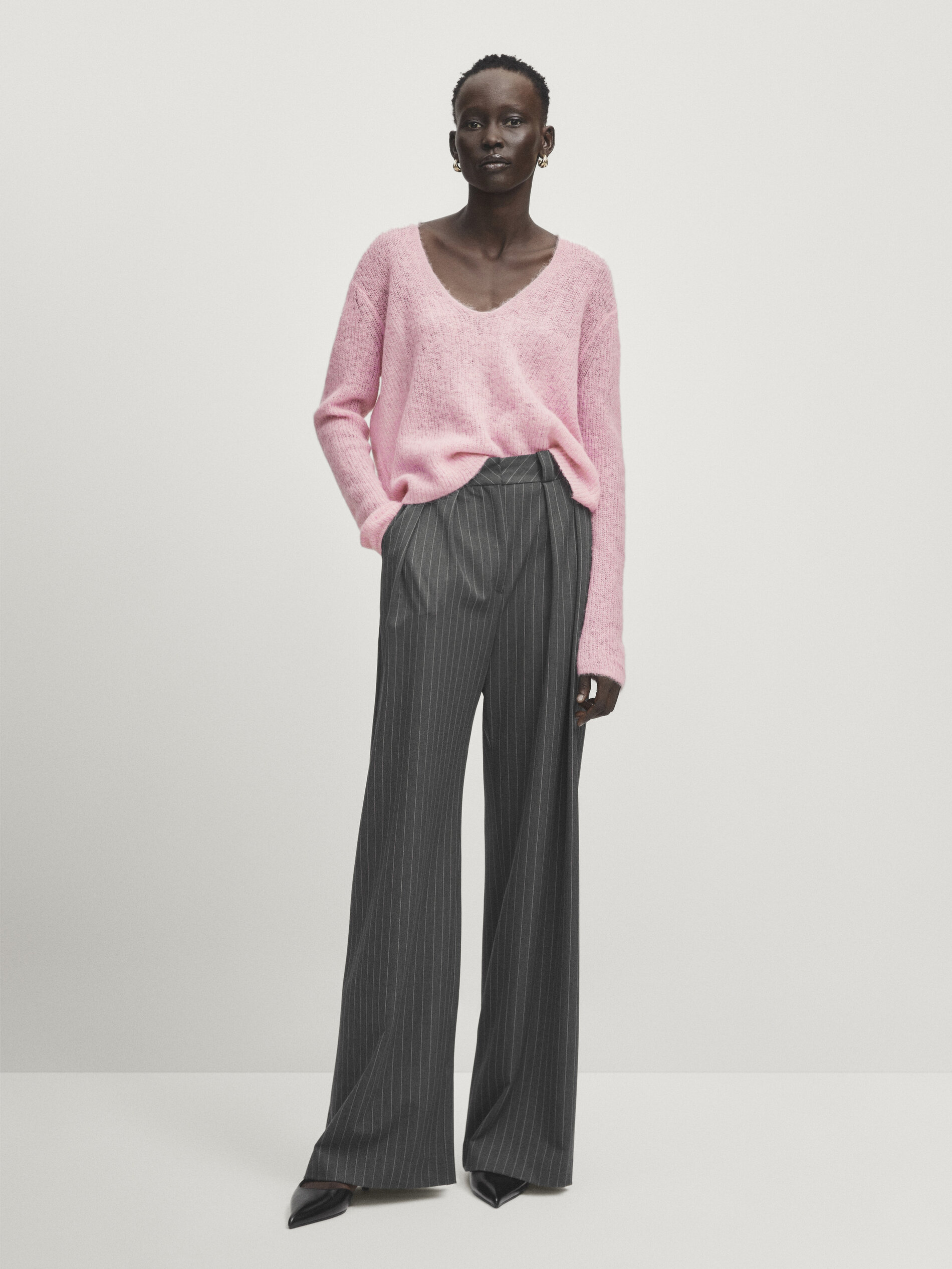 Pink sweater grey pants hot sale