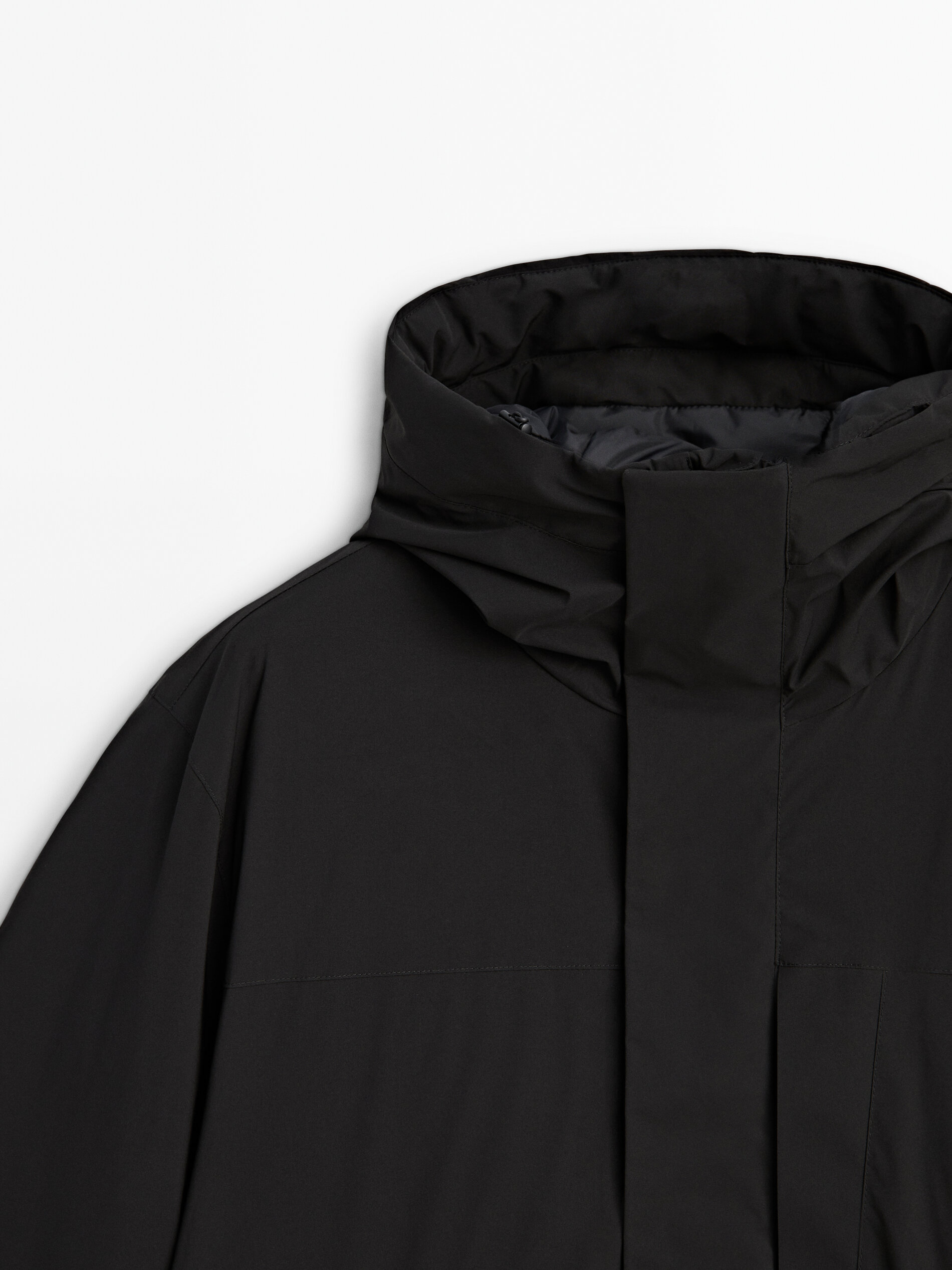 Hooded black parka with down and feather padding