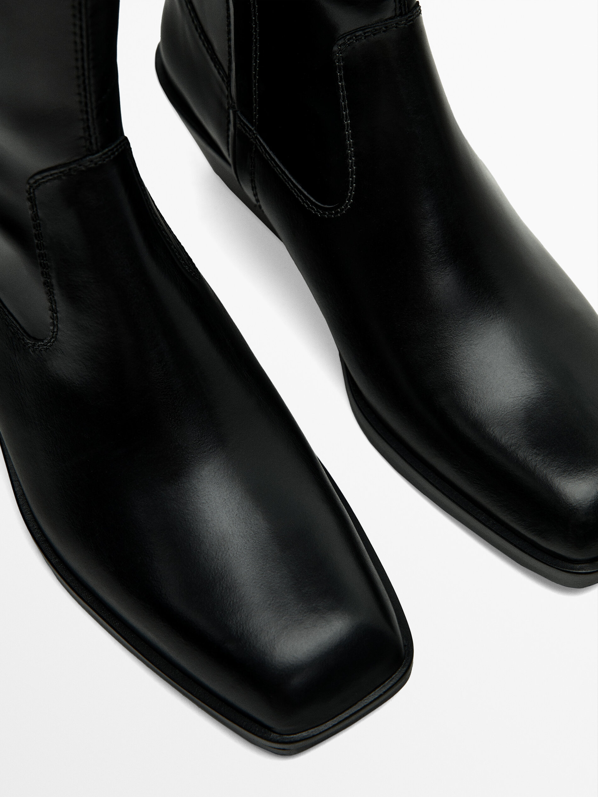 Heeled square toe ankle boots