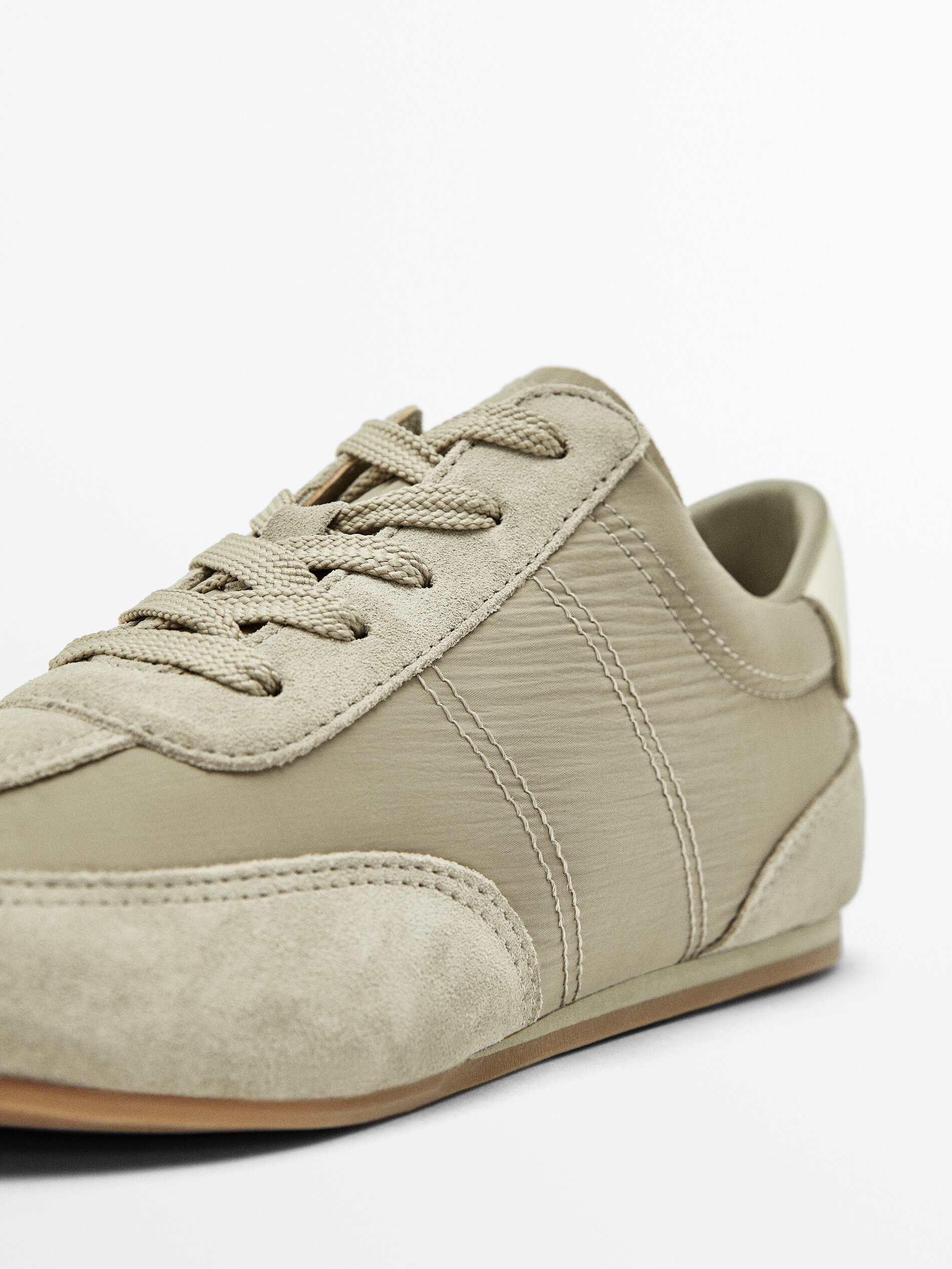 Grey fabric trainers 2025
