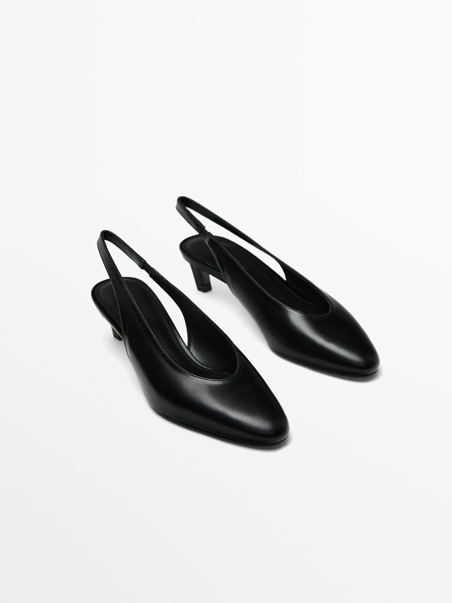 Slingback schoen met hak en ronde neus