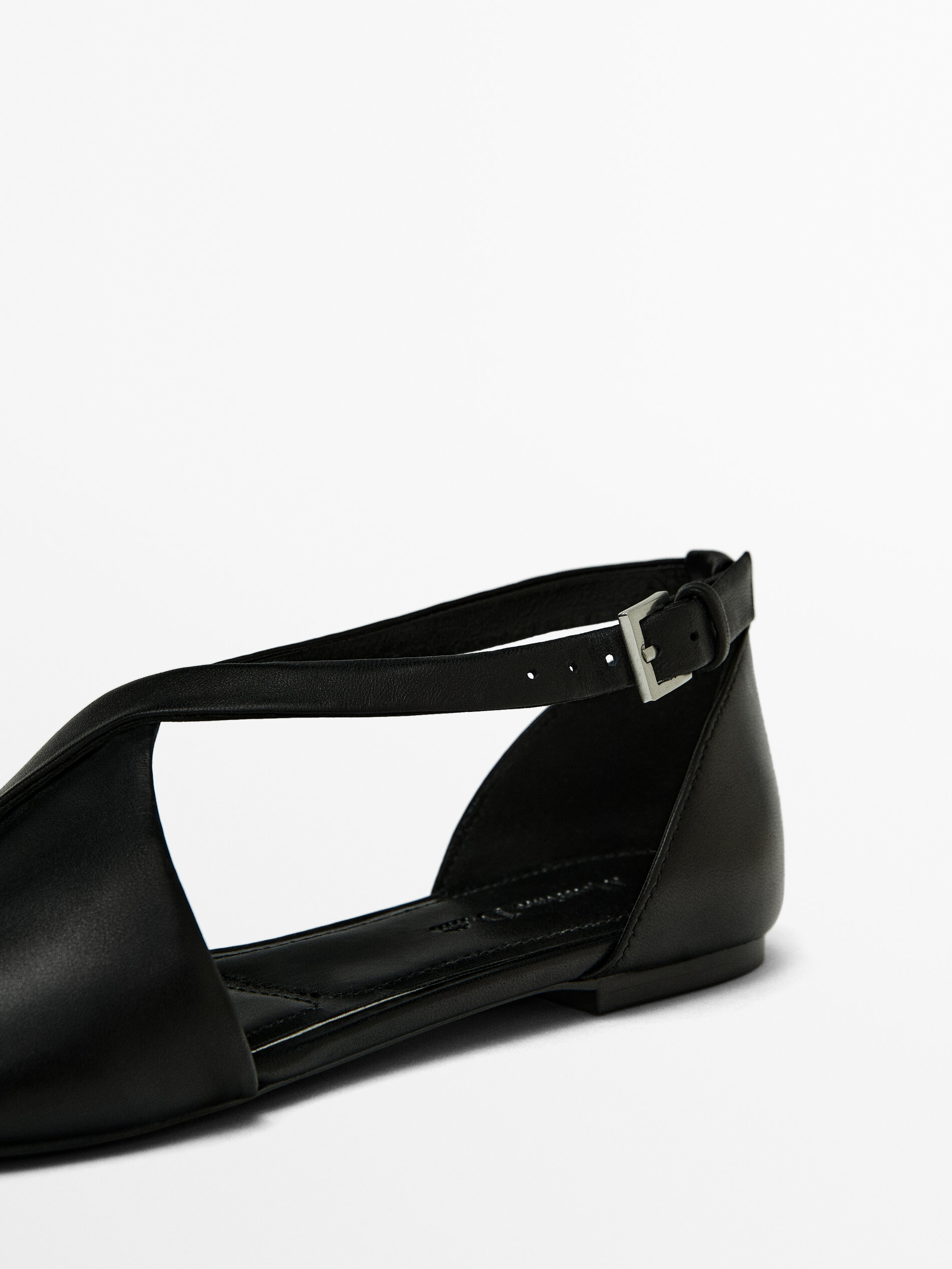 Flat cut out slingback shoes with crossed detail
