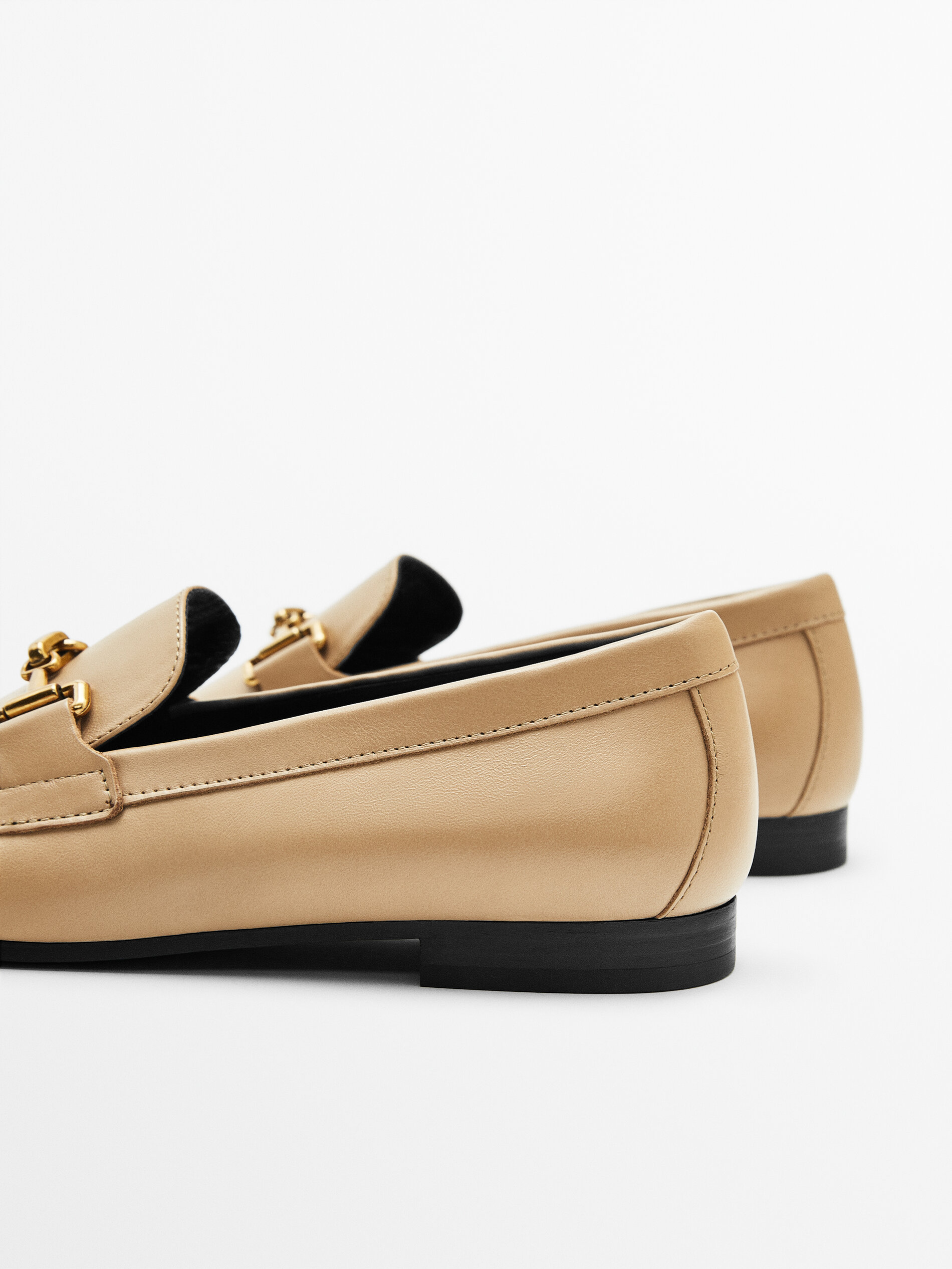Leather loafers with metal buckle