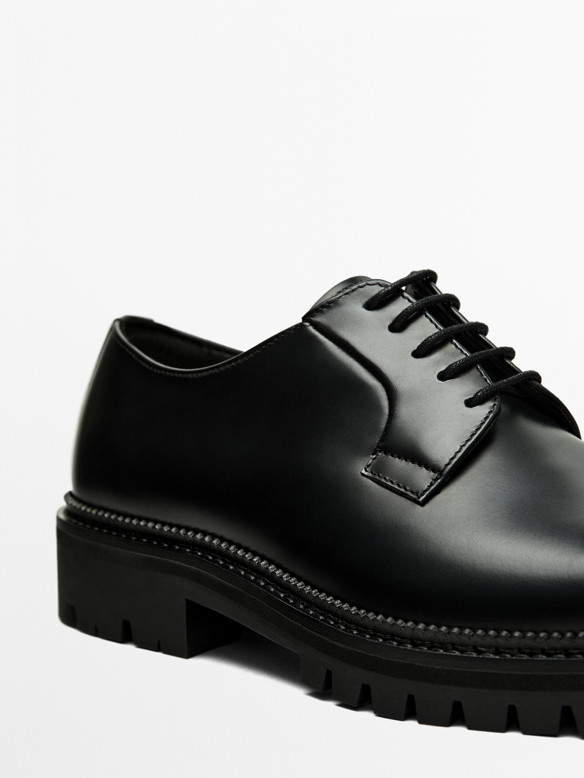 Black leather soled shoes online
