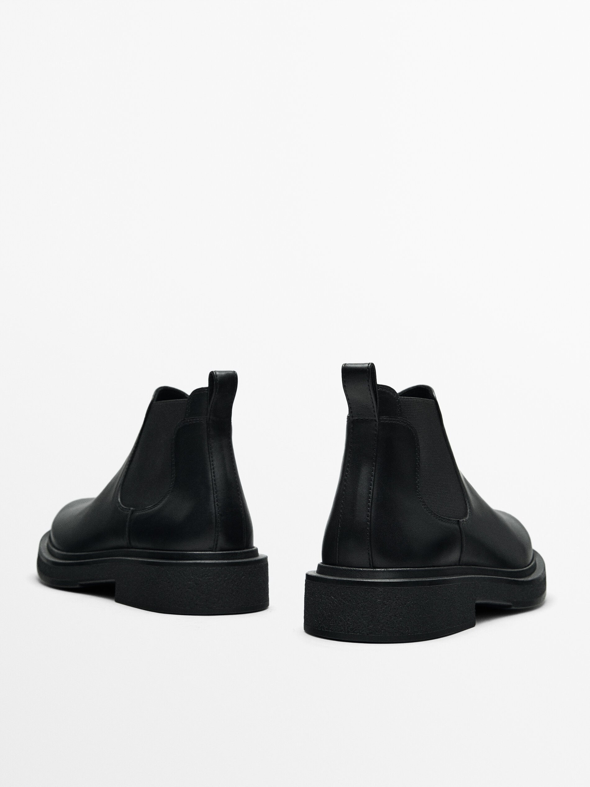 Black Chelsea boots Studio