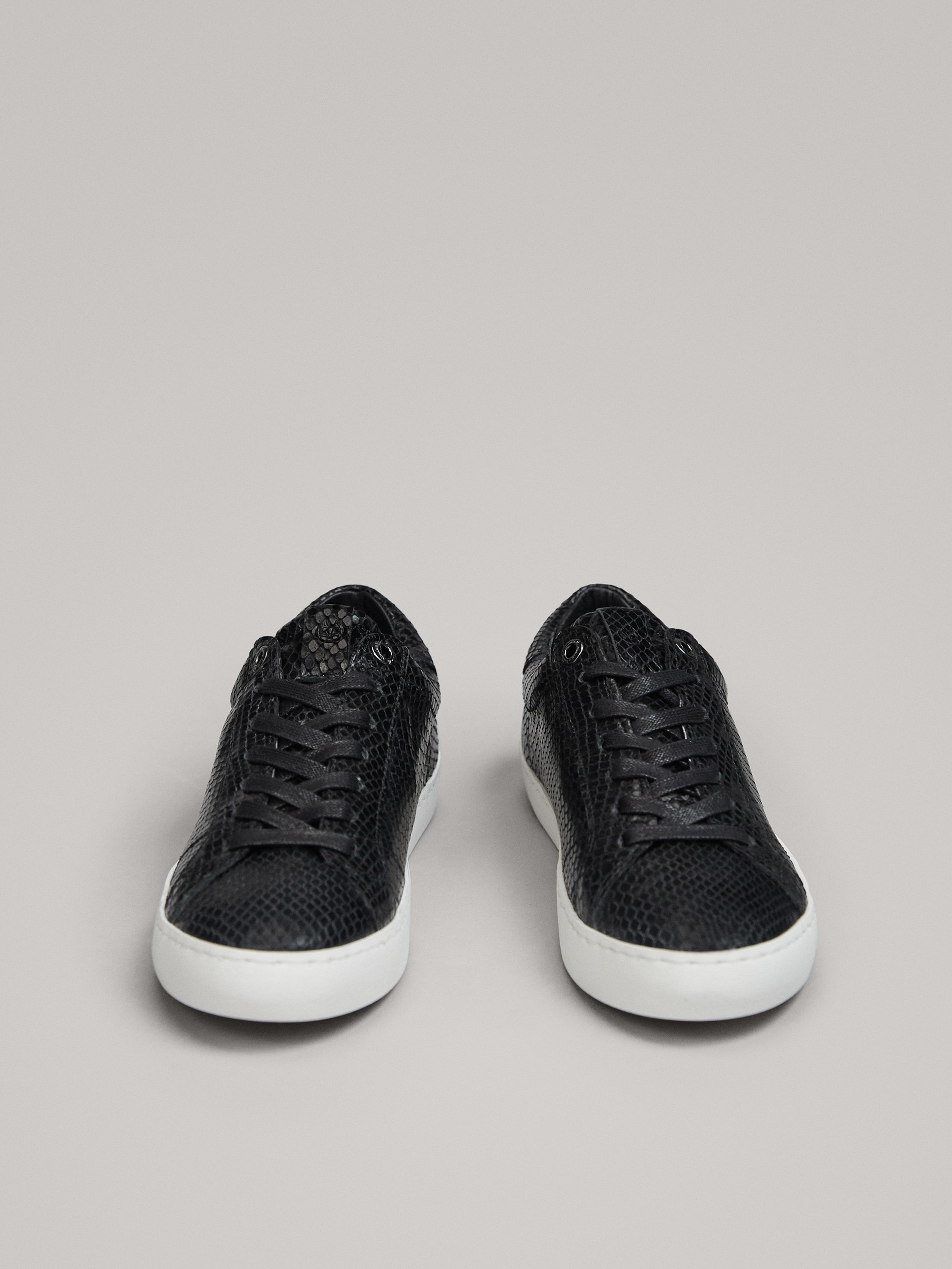black leather plimsolls