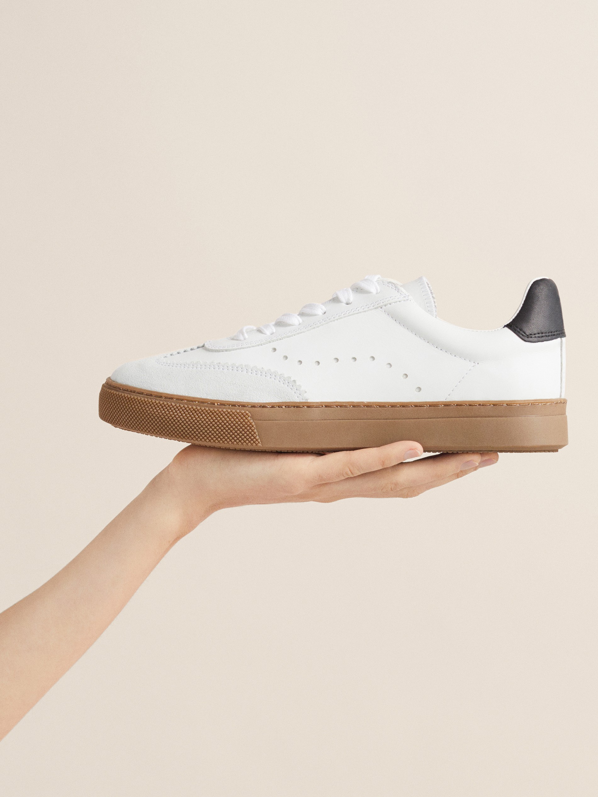 black leather plimsolls