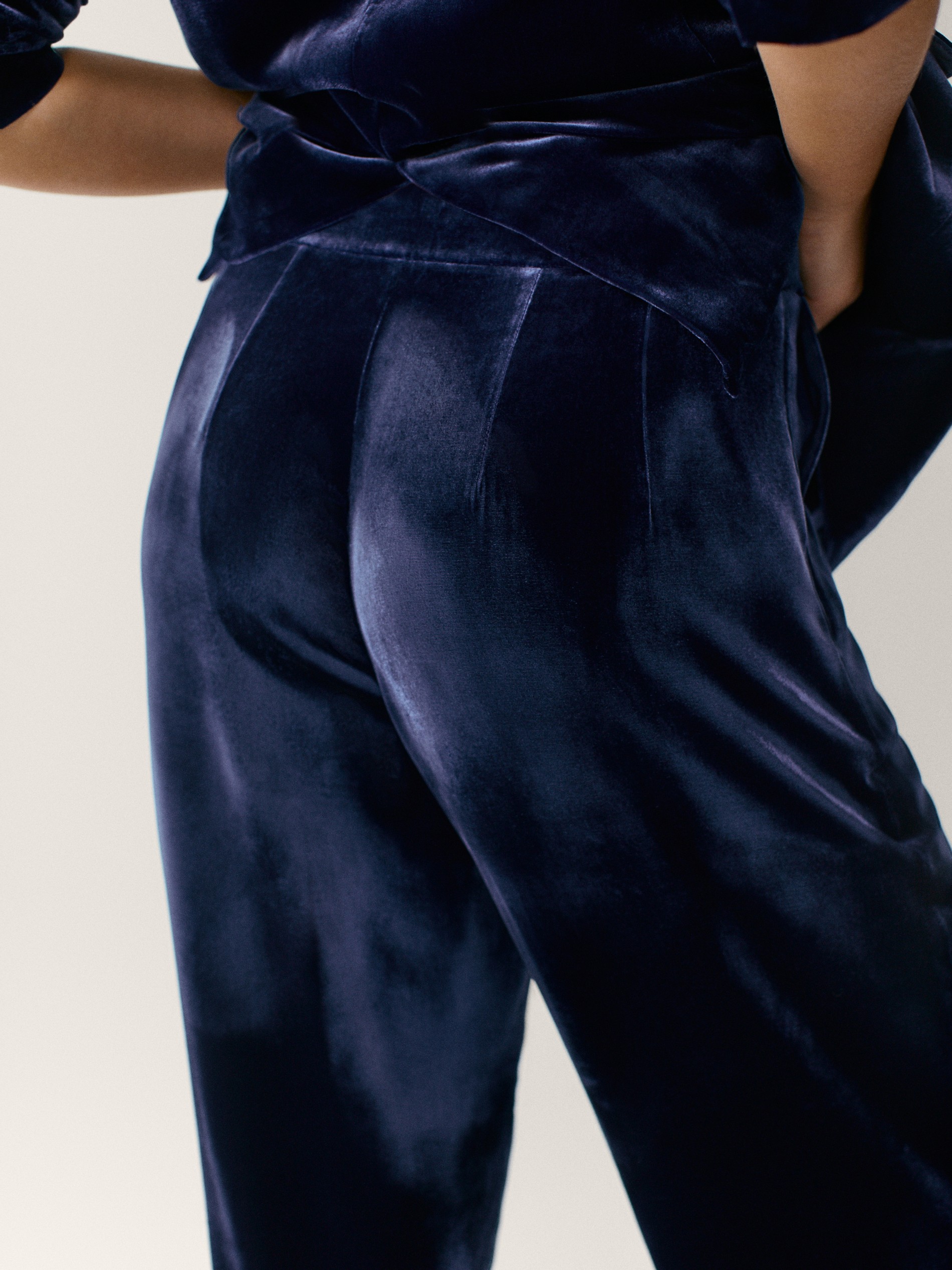 dark blue velvet trousers