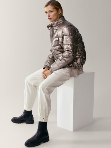 Trousers with snap-button hems