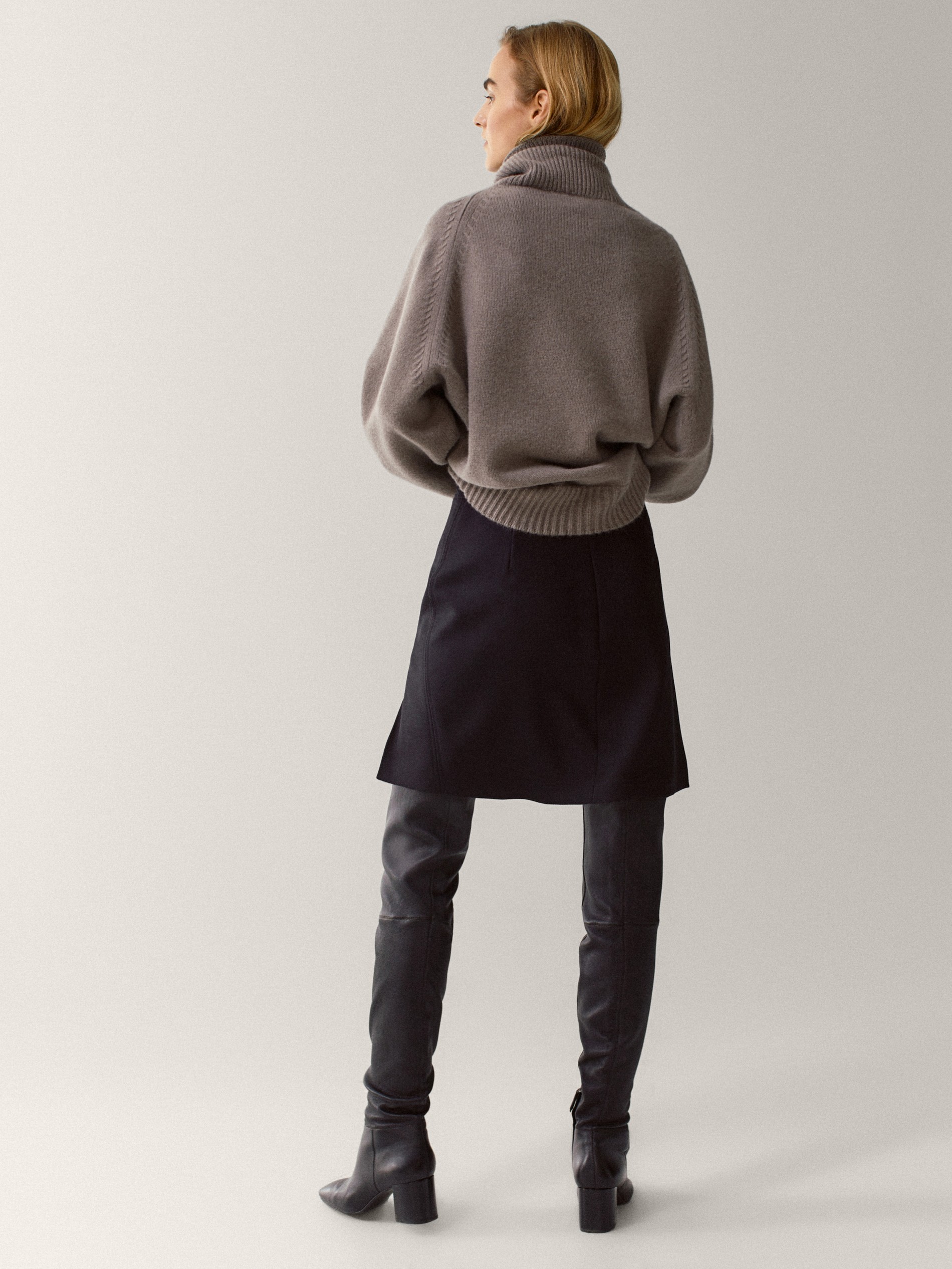 short skirt with knee high boots