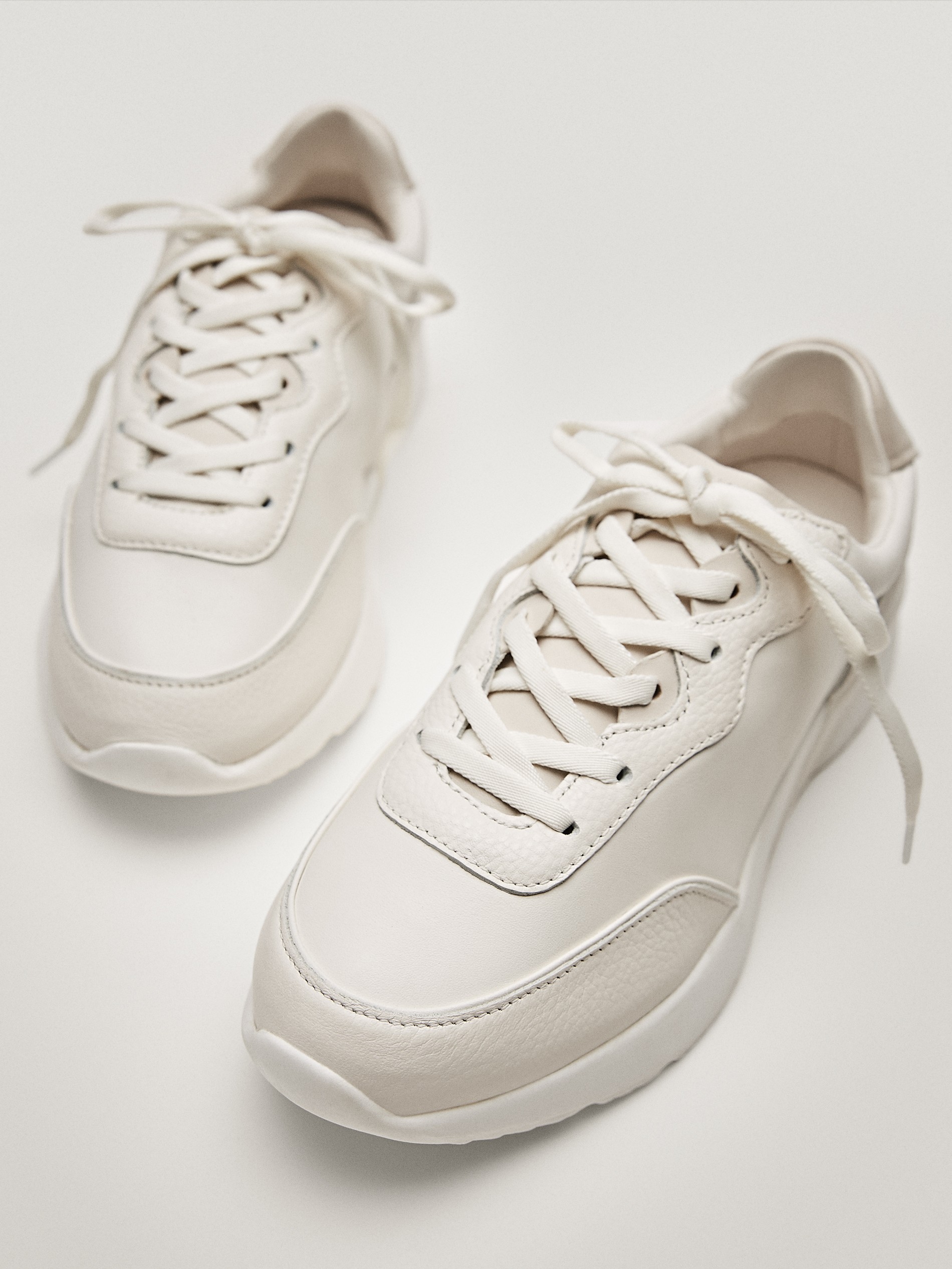 White trainers with leather piece sole 