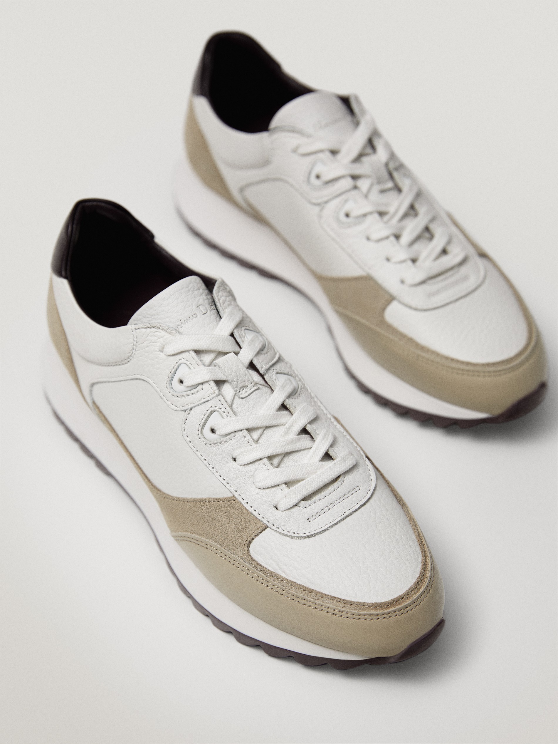 white heeled trainers