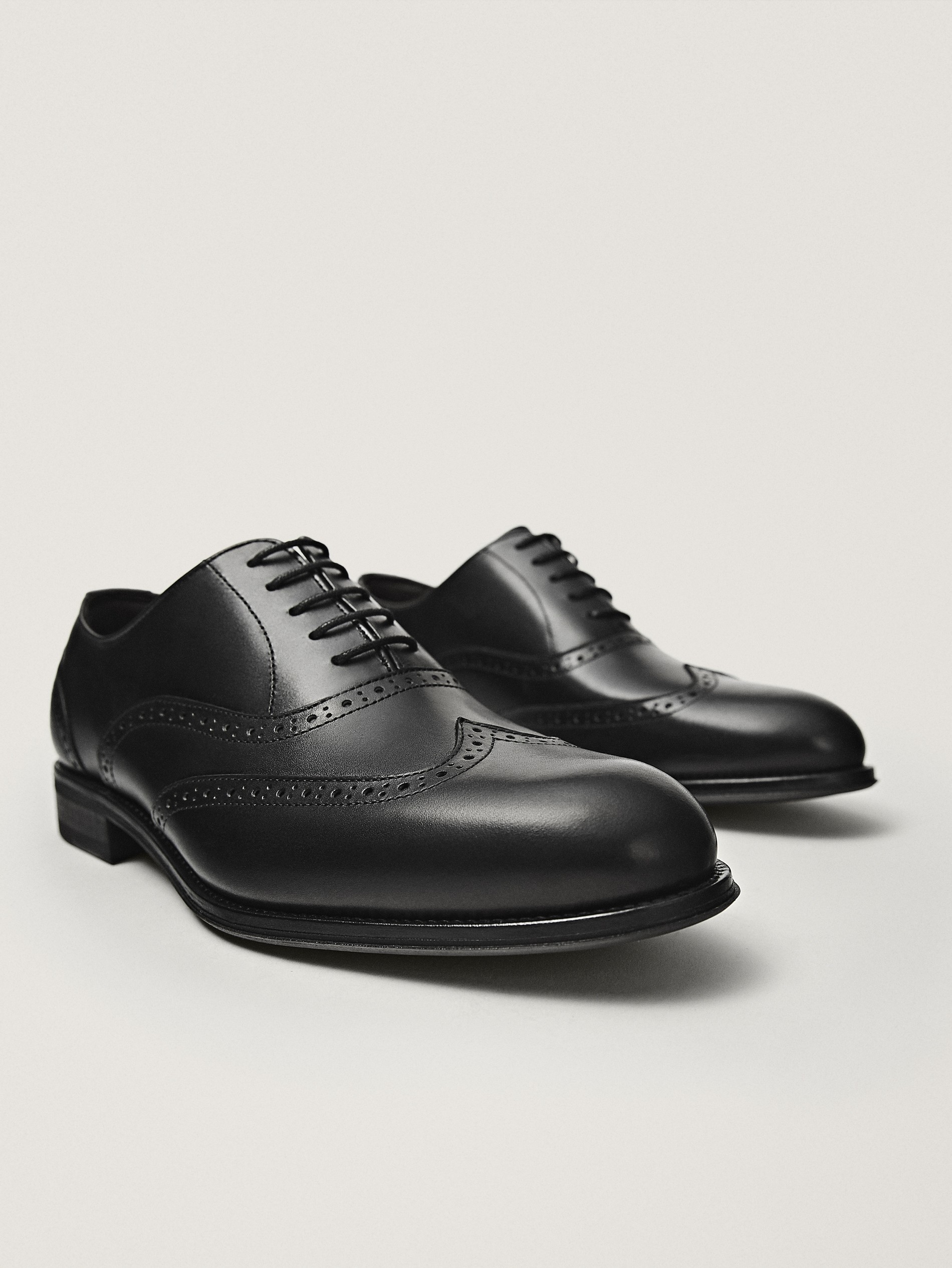 black leather brogues