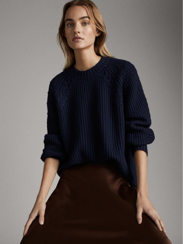 High neck purl-knit wool sweater
