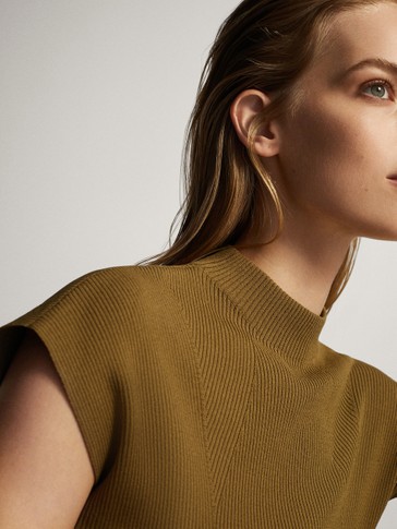 High neck sweater with decrease stitch detail