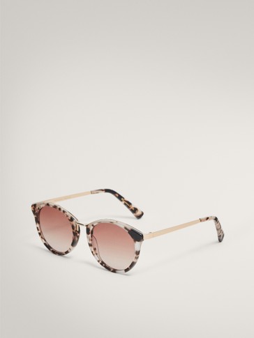 Round black and white tortoiseshell sunglasses