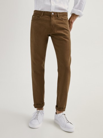 CASUAL FIT DENIM-EFFECT TROUSERS