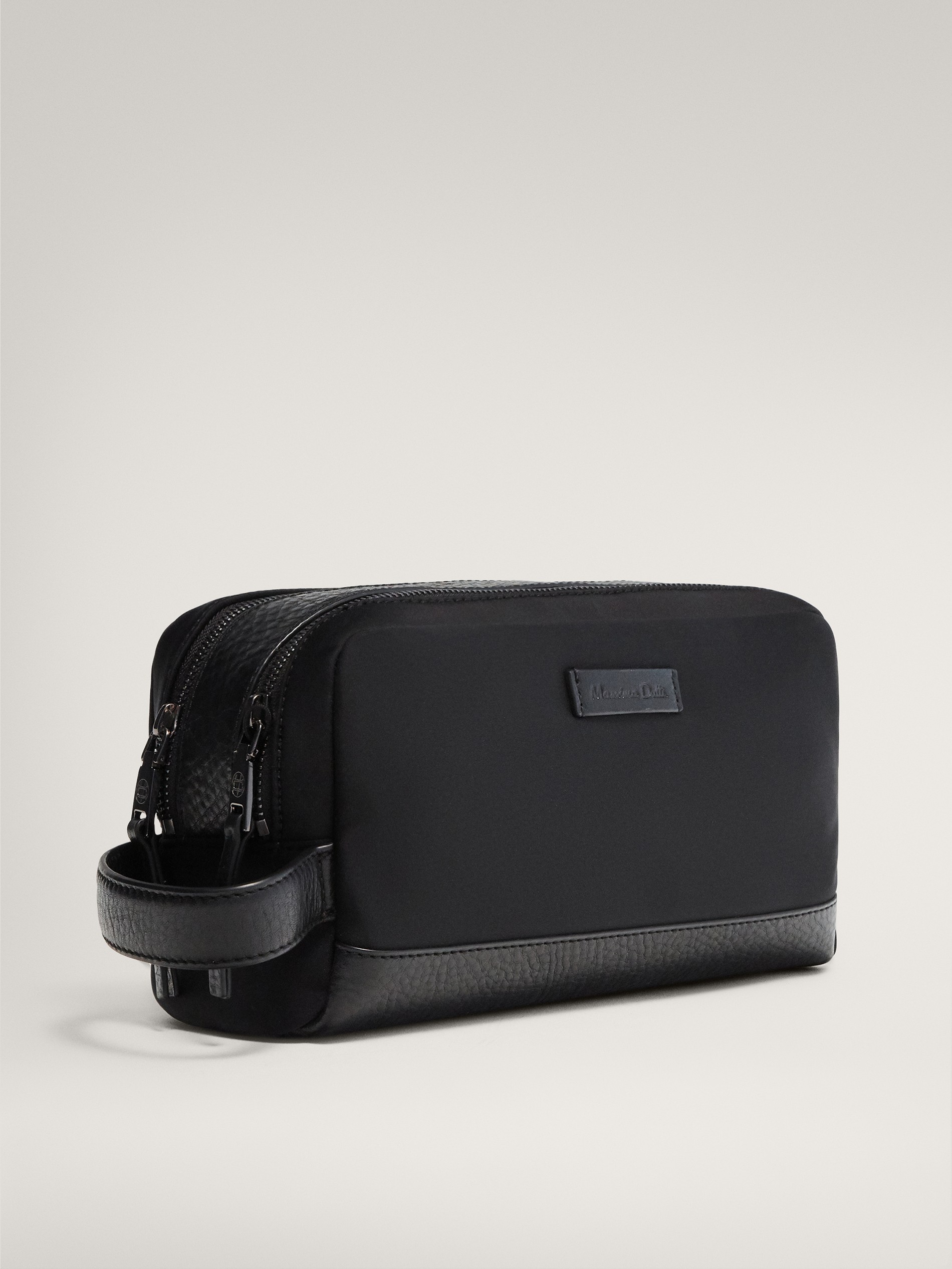 black leather toiletry bag