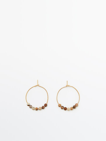 Gold-plated hoop earrings with brown stones