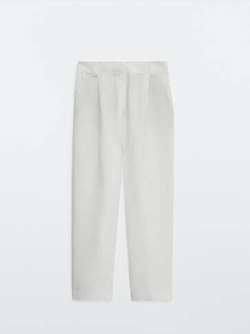 Straight fit trousers with topstitching at the waist