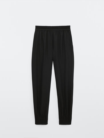 Flowing jogging fit trousers with elastic hems