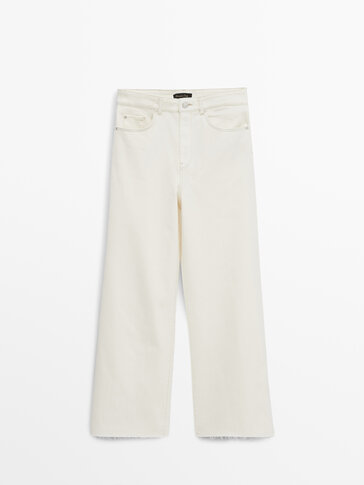 Укорочені джинси з широкими штанинами