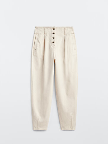 Slouchy trousers with button detail