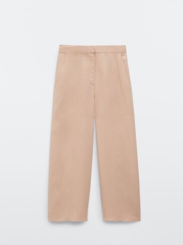 Здолниште-панталони со контрастни штепови и џебови