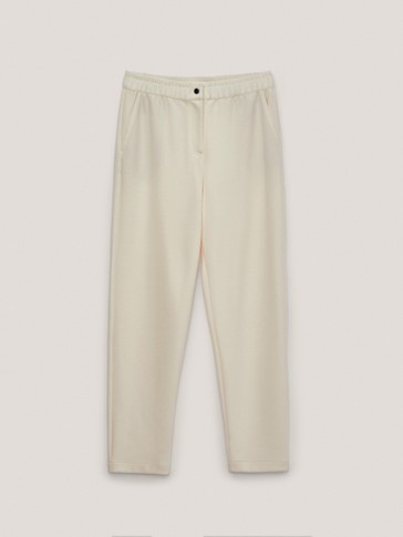 Jogging trousers with buttoned waist