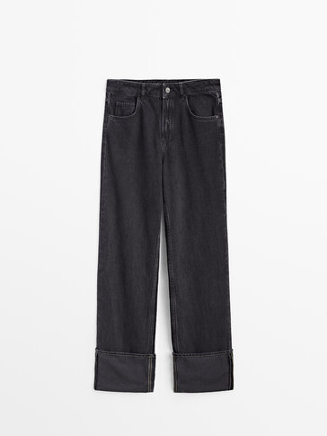Jeans de cintura subida com dobra em baixo