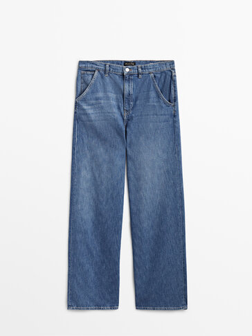 Volné džíny vysokým pasem