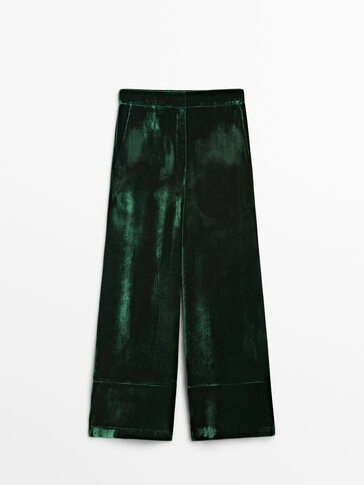 Green velvet trousers