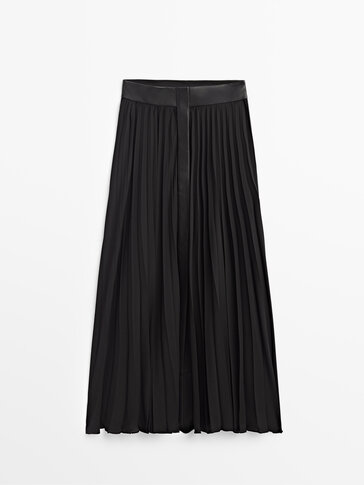 PLEATED SKIRT WITH LEATHER DETAILS