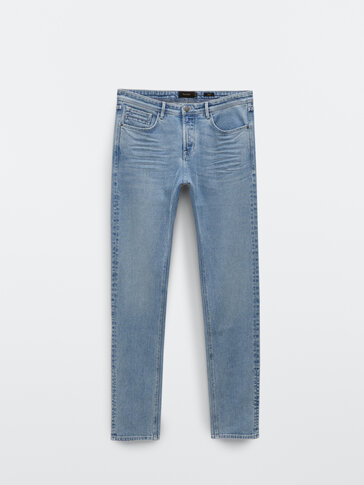 Jeans slim fit effetto slavato
