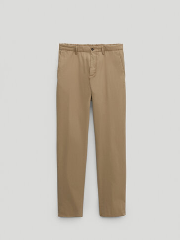 Slim-fit trousers with an elastic waist