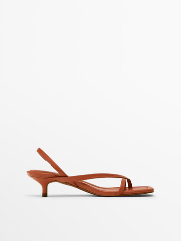 Orange asymmetric strap heeled sandals