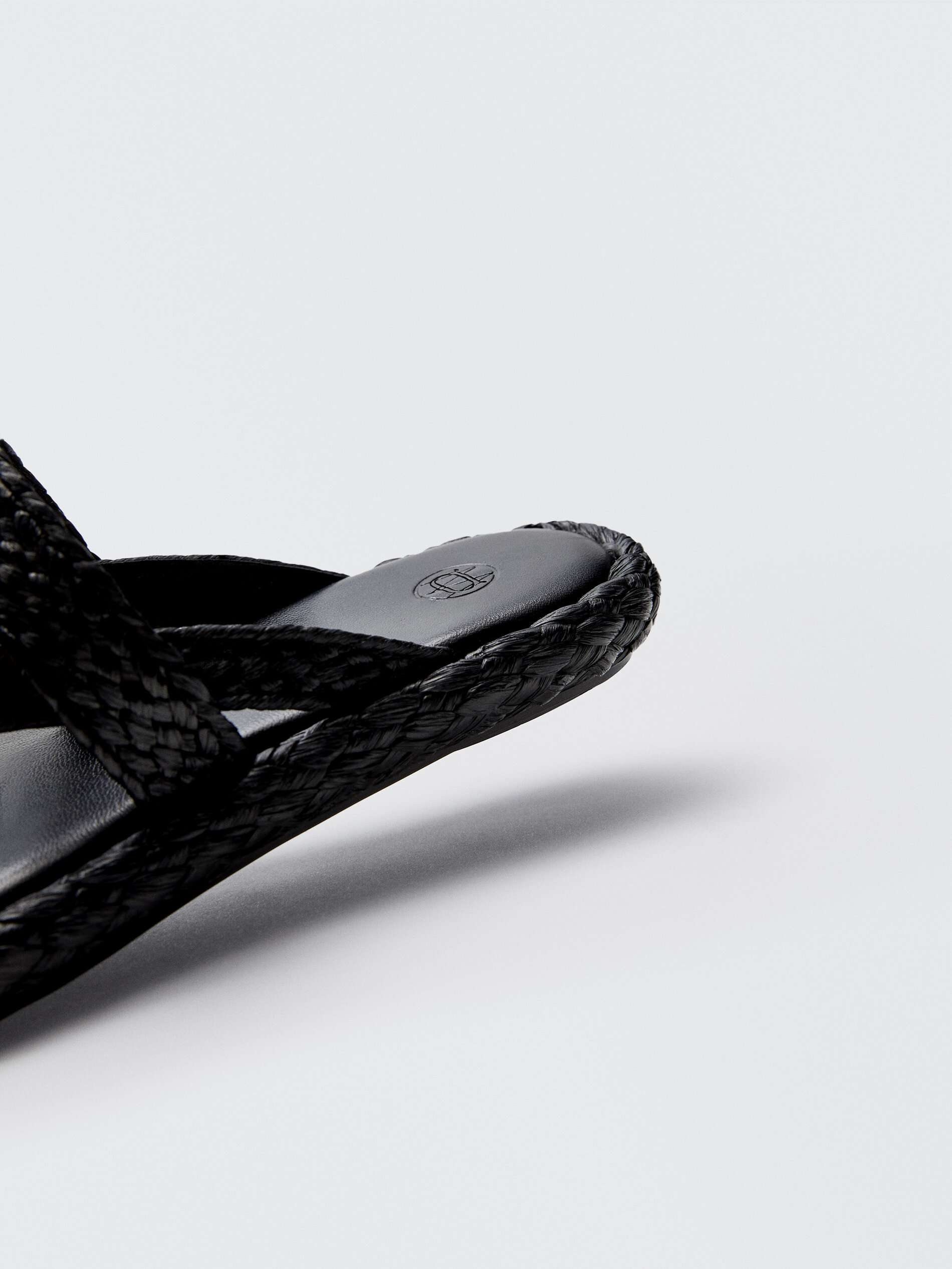 black raffia sandals