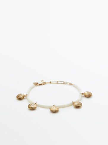 Bracelet perles fantaisie blanches coquillages plaqué or