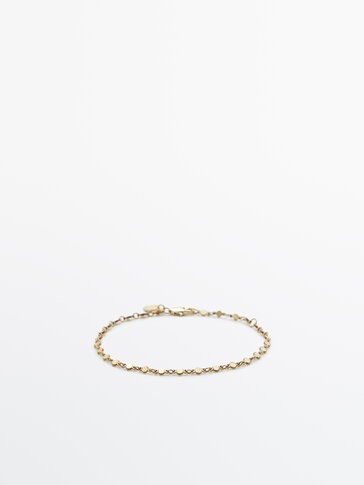 Gold-plated bracelet with suns