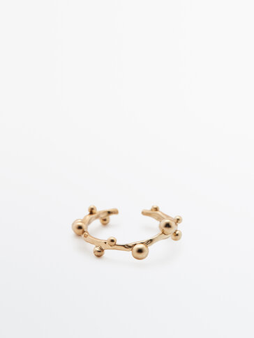 Thin gold-plated ring with irregular texture