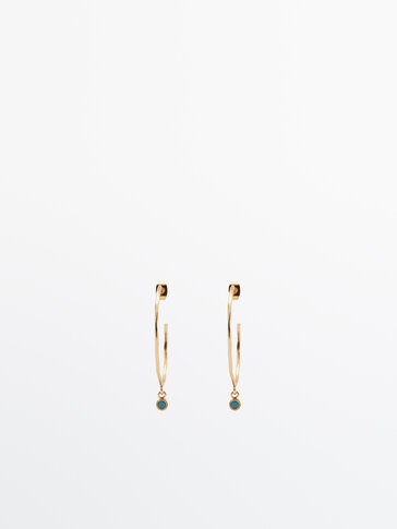 Gold-plated hoop earrings with blue stone