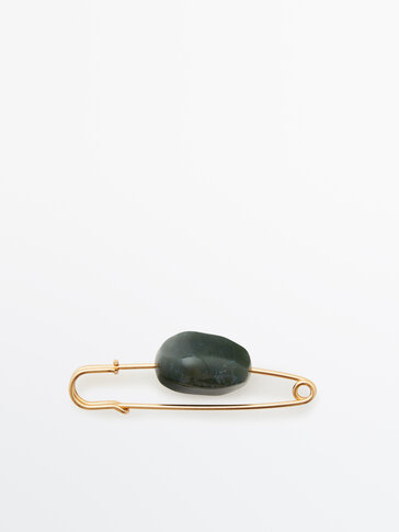 Brooch with green stone