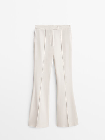 Bootcut trousers with central seam