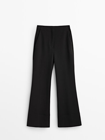 Trousers with turn-up hems and topstitching