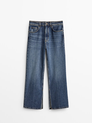 Jeans crop lurus dengan belahan